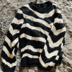 Black and white sweater.